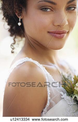 Portrait of bride with bouquet View Large Photo Image Picture - Portrait of bride with bouquet. Fotosearch