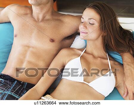 Portrait of couple relaxing View Large Photo Image Picture - Portrait of couple relaxing. Fotosearch
