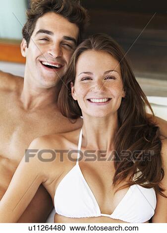 Stock Image - Portrait of couple smiling. Fotosearch