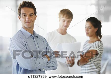 Portrait of coworkers in office View Large Photo Image Stock Photo - Portrait of coworkers in office. Fotosearch