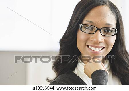 Picture - Portrait of female office worker. Fotosearch