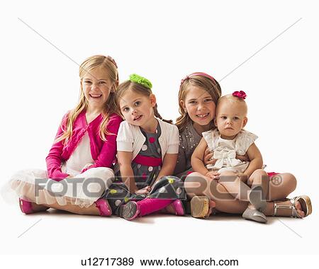 Portrait of four sisters (18-23 months, 2-3, 6-7) View Large Photo Image Stock Photo - Portrait of four sisters (18-23 months, 2-3, 6-7). Fotosearch