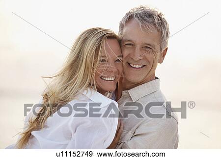 Portrait of happy mature couple View Large Photo Image Stock Photo - Portrait of happy mature couple. Fotosearch