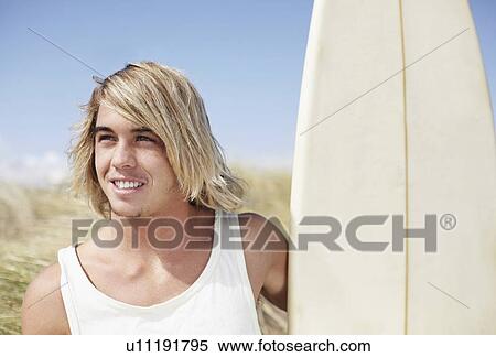 Portrait of male surfer View Large Photo Image Stock Photography - Portrait of male surfer. Fotosearch