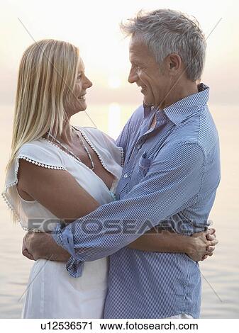 Portrait of mature couple at sunset View Large Photo Image Stock Image - Portrait of mature couple at sunset. Fotosearch