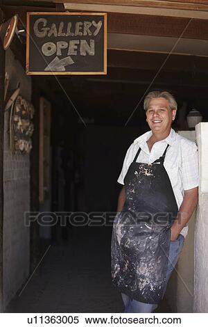 Portrait of mature male potter standing in front of gallery View Large Photo Image Stock Photography - Portrait of mature male potter standing in front of gallery. Fotosearch