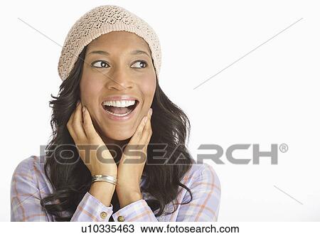 Stock Image - Portrait of mid adult woman. Fotosearch