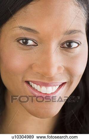 Stock Photo - Portrait of mid adult woman. Fotosearch