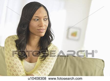 Stock Photo - Portrait of mid adult woman. Fotosearch