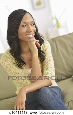 Stock Photo - Portrait of mid adult woman. Fotosearch