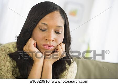 Stock Photograph - Portrait of mid adult woman. Fotosearch