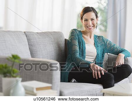 Stock Photograph - Portrait of mid adult woman. Fotosearch