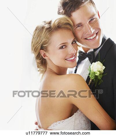 Stock Photo - Portrait of newly wed couple. Fotosearch
