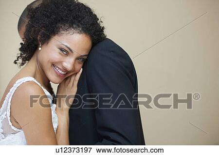 Stock Photo - Portrait of newly wed couple. Fotosearch