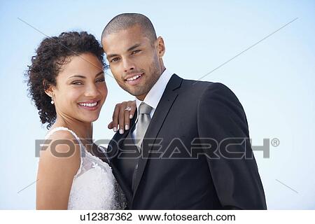 Portrait of newlywed couple View Large Photo Image Stock Image - Portrait of newlywed couple. Fotosearch