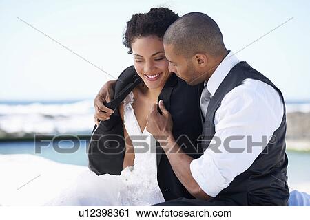 Stock Image - Portrait of newlywed couple. Fotosearch