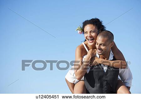 Portrait of newlywed couple View Large Photo Image Stock Image - Portrait of newlywed couple. Fotosearch