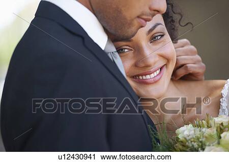 Portrait of newlywed couple View Large Photo Image Stock Image - Portrait of newlywed couple. Fotosearch