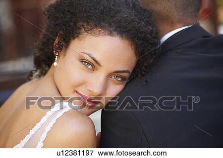 Stock Photo - Portrait of newlywed couple. Fotosearch