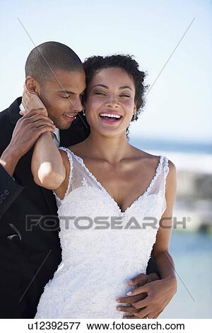 Portrait of newlywed couple View Large Photo Image Stock Photo - Portrait of newlywed couple. Fotosearch