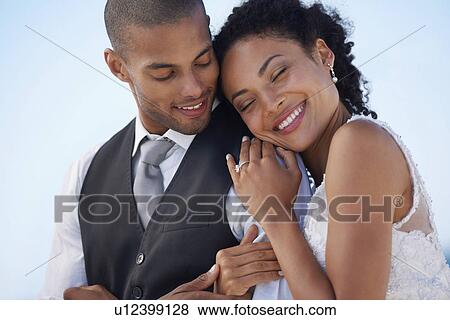 Portrait of newlywed couple View Large Photo Image Stock Photo - Portrait of newlywed couple. Fotosearch