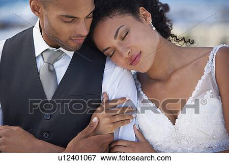 Portrait of newlywed couple View Large Photo Image Stock Photo - Portrait of newlywed couple. Fotosearch