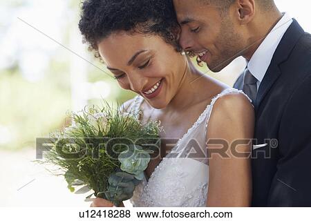 Stock Photo - Portrait of newlywed couple. Fotosearch