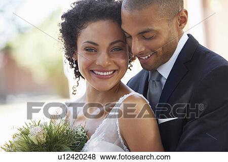 Portrait of newlywed couple View Large Photo Image Stock Photo - Portrait of newlywed couple. Fotosearch
