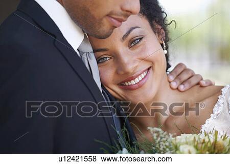Portrait of newlywed couple View Large Photo Image Stock Photo - Portrait of newlywed couple. Fotosearch