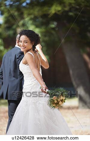 Portrait of newlywed couple View Large Photo Image Stock Photo - Portrait of newlywed couple. Fotosearch