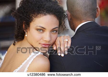 Portrait of newlywed couple View Large Photo Image Stock Photograph - Portrait of newlywed couple. Fotosearch