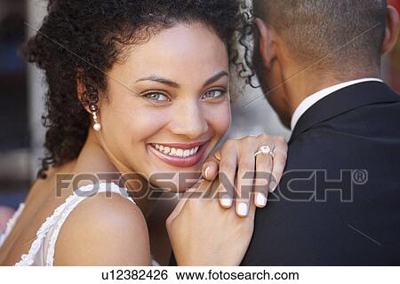 Portrait of newlywed couple View Large Photo Image Stock Photograph - Portrait of newlywed couple. Fotosearch