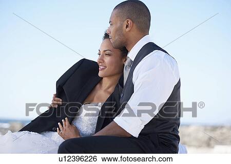 Portrait of newlywed couple View Large Photo Image Stock Photograph - Portrait of newlywed couple. Fotosearch