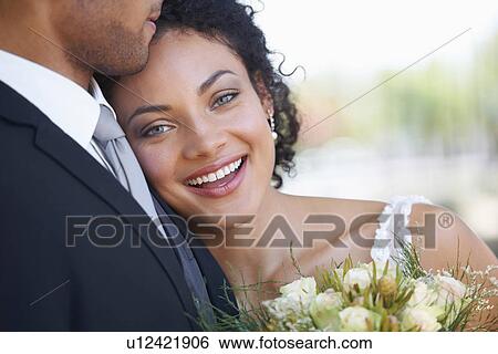 Stock Photograph - Portrait of newlywed couple. Fotosearch
