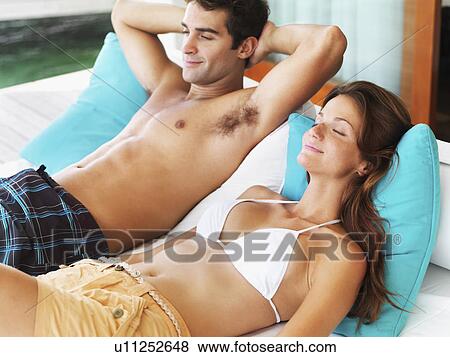Portrait of relaxing couple View Large Photo Image Stock Photo - Portrait of relaxing couple. Fotosearch