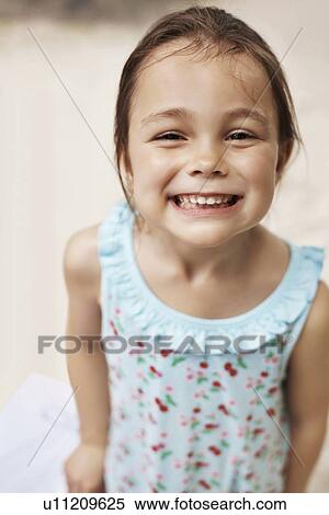 Stock Photography - Portrait of smiling girl (6-7). Fotosearch