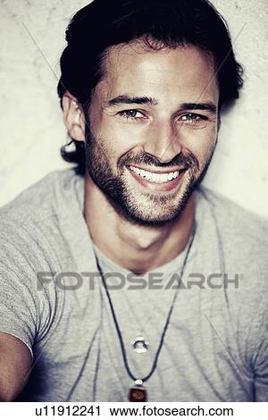 Portrait of smiling man View Large Photo Image Stock Image - Portrait of smiling man. Fotosearch