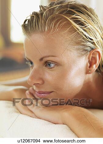 Picture - Portrait of woman relaxing in spa. Fotosearch