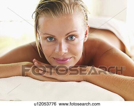 Portrait of woman relaxing in spa View Large Photo Image Stock Photograph - Portrait of woman relaxing in spa. Fotosearch