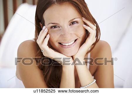 Stock Photography - Portrait of woman smiling. Fotosearch