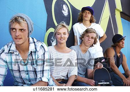 Stock Image - Portrait of young skateboarders. Fotosearch