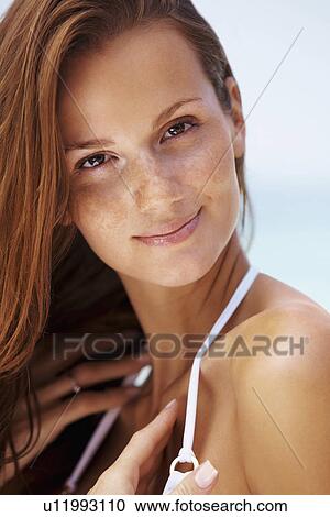 Portrait of young woman in bikini View Large Photo Image Stock Image - Portrait of young woman in bikini. Fotosearch