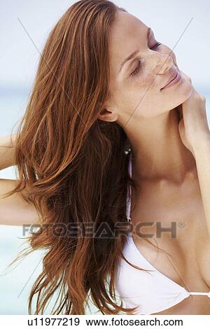 Portrait of young woman in bikini View Large Photo Image Stock Photo - Portrait of young woman in bikini. Fotosearch