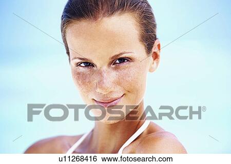 Stock Photograph - Portrait of young woman . Fotosearch
