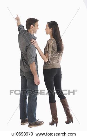 Rear view of couple View Large Photo Image Stock Photo - Rear view of couple. Fotosearch