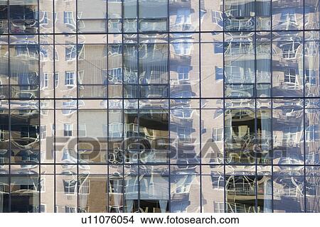 Reflection on glass skyscraper View Large Photo Image Picture - Reflection on glass skyscraper. Fotosearch