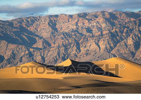 Sand dunes and mountains View Large Photo Image Stock Image - Sand dunes and mountains. Fotosearch