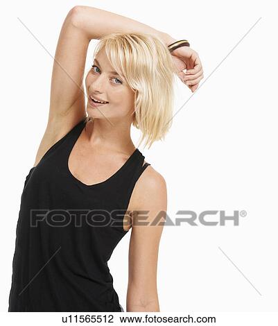Stock Image - Studio portrait of attractive woman. Fotosearch