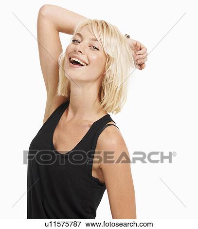 Stock Photo - Studio portrait of attractive woman. Fotosearch