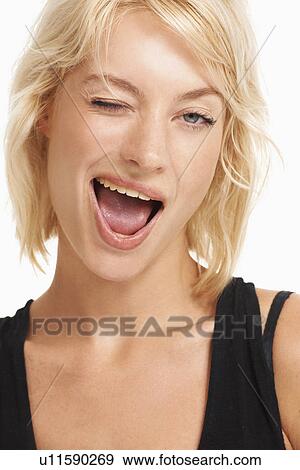 Stock Photo - Studio portrait of attractive woman. Fotosearch